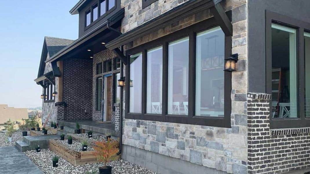 2-exterior-style-mashup A 2 style mashup of Casa di Sassi stone veneer & brick.